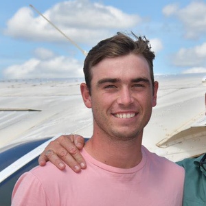 Close up of UNE Agribusiness student Adrian Burl in pink t-shirt